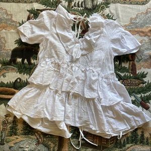 Frilly white babydoll blouse with 3 ties